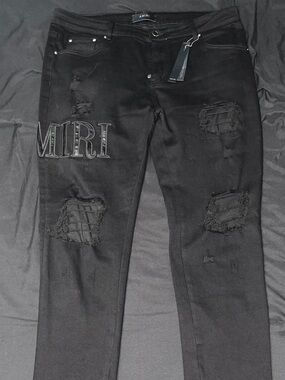 AMIRI Black Slim Distressed Jeans with Embroidered MIRI Patch